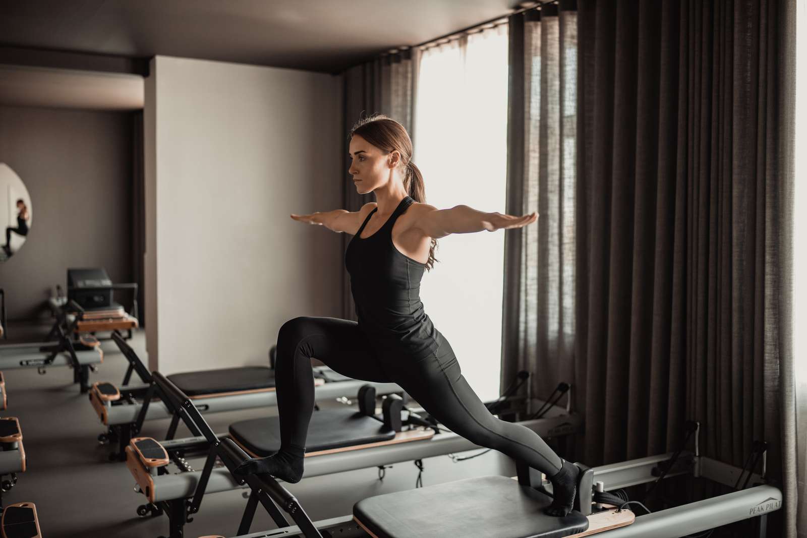 Kvinde på reformer maskine